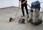 Wet-dry vacuum cleaner application - vacuuming up dust, screws and liquids