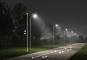 LED solar street lamp SL6000 in application example, dimensioned at night, height 6 m, distance 15 m