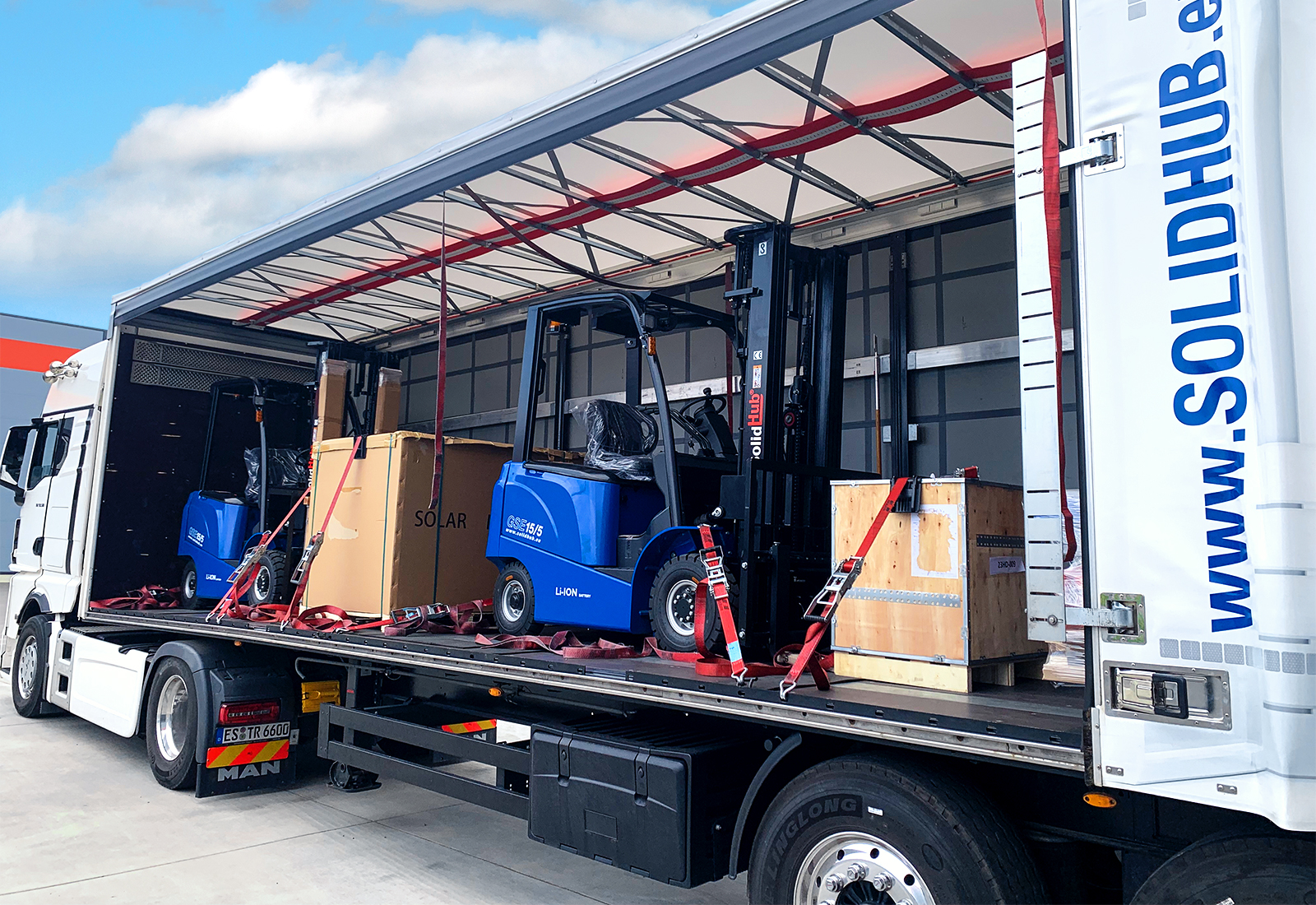 Goods ready for dispatch on lorry with load securing